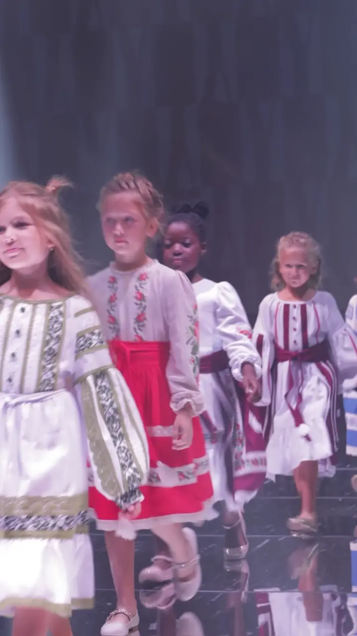 Young models in the group finale on the runway, then make-up backstage